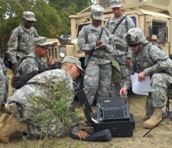 Troops working with on the ground equipment